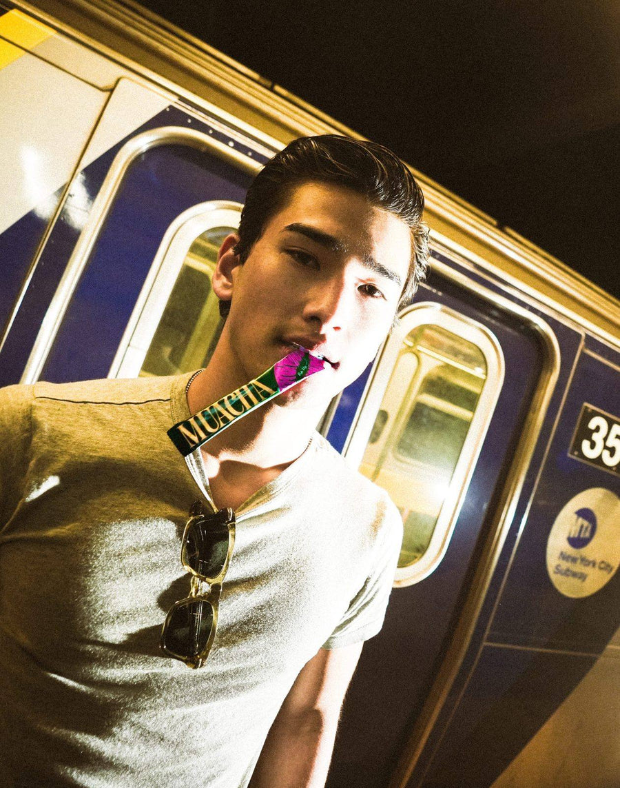 Model on the subway platform with a stick pack